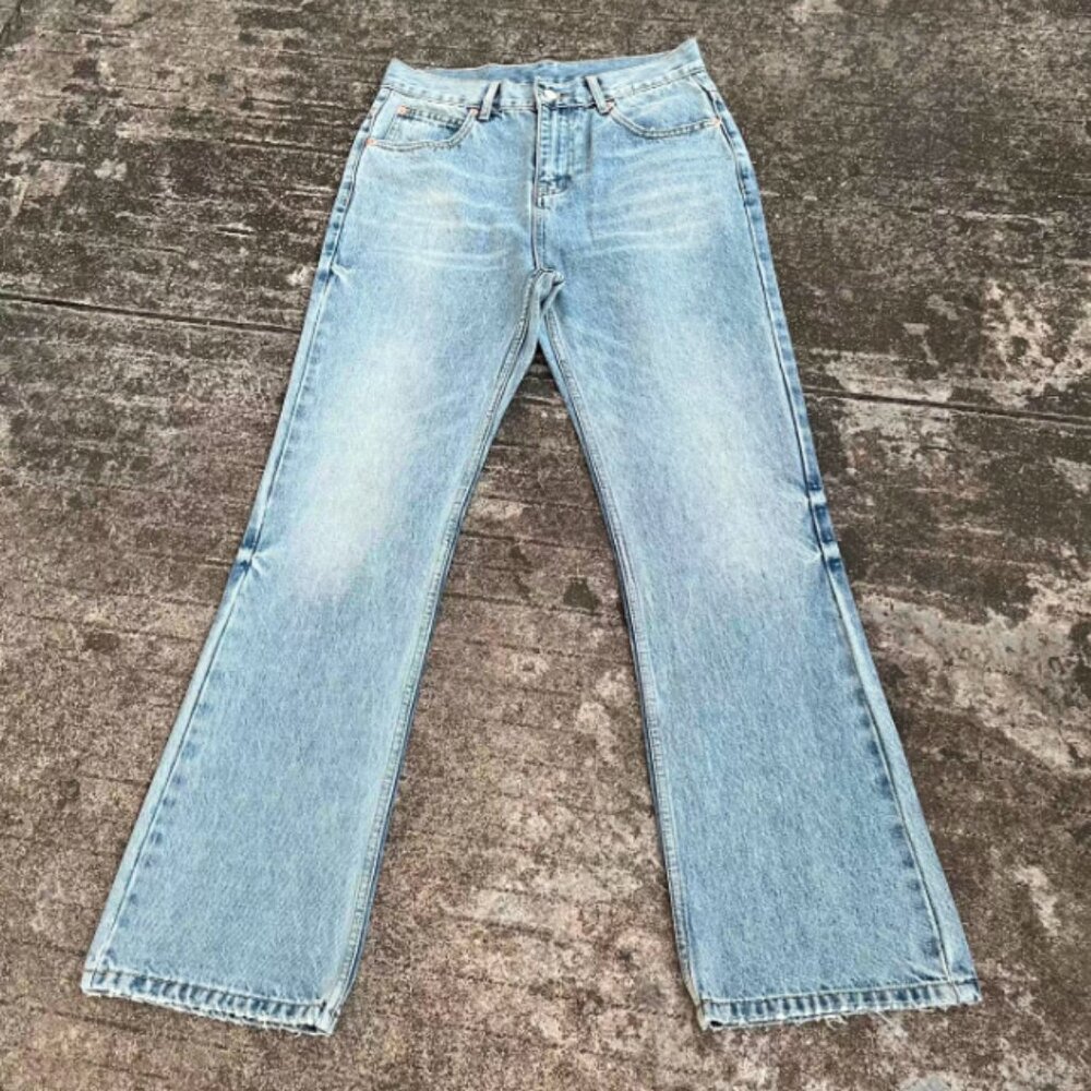 Vintage washed snowflake ice blue flared jeans.